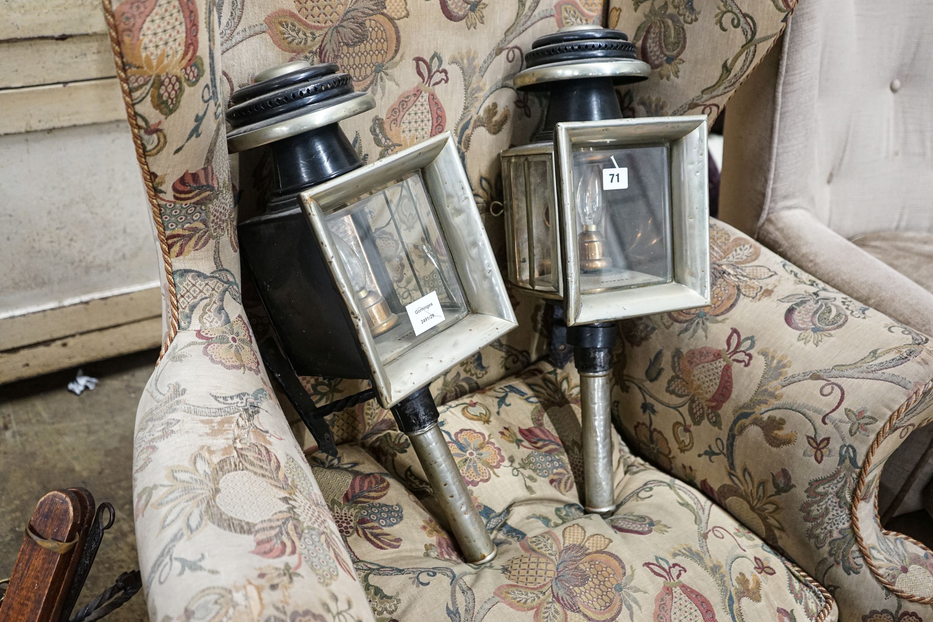 A pair of Victorian painted and polished steel carriage lamps, height 55cm